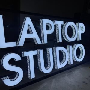 Laptop Studio glitter signboard with 3D front-lit letters