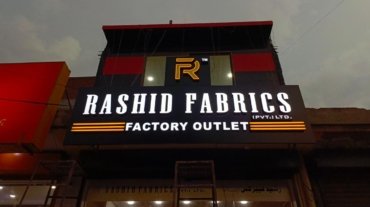 Rashid Fabrics Factory Outlet 3D illuminated signboard in Multan